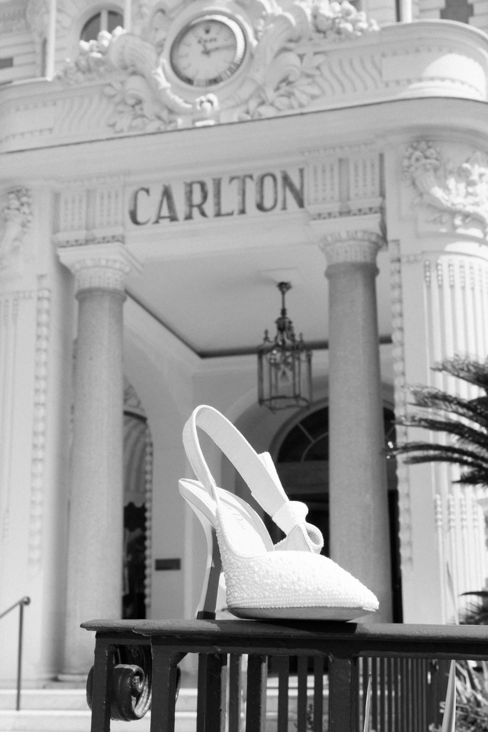 Iconic architecture of the Carlton Cannes during a luxury Côte d’Azur wedding, captured in an editorial style by Alex West Photography